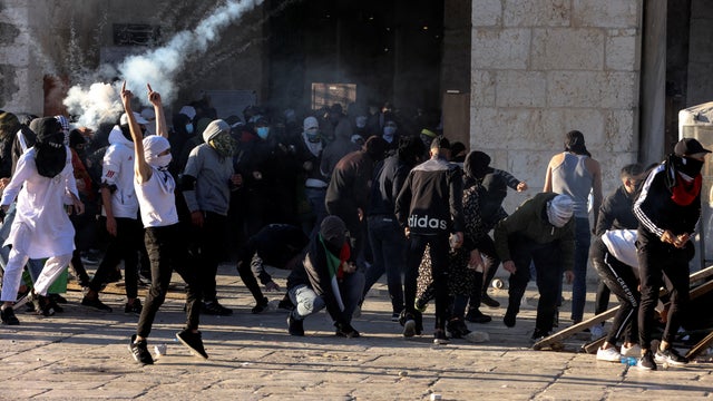 Palestinian protestors clash with Israeli security forces at the compound that houses Al-Aqsa Mosque, known to Muslims as Noble Sanctuary and to Jews as Temple Mount, in Jerusalem's Old City