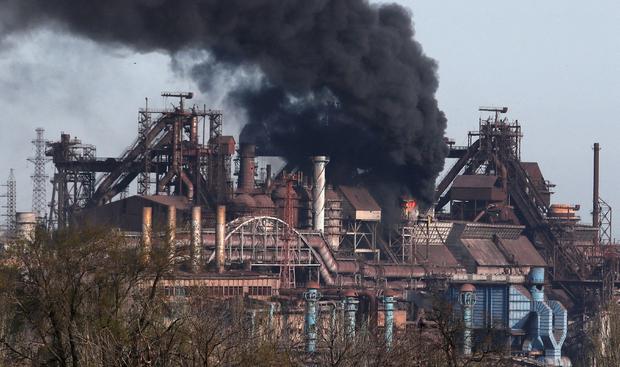 FILE PHOTO: Smoke rises above a plant of Azovstal Iron and Steel Works in Mariupol 