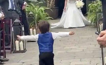 Toddler runs down aisle to mom 