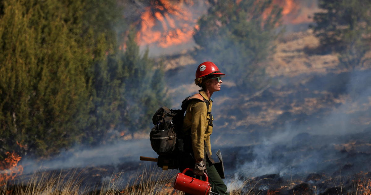 Wildfires threaten Southwest as predicted "unprecedented" winds could drive New Mexico flames