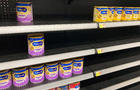 A baby formula display shelf is seen at a Walmart grocery 