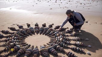 Land artist Jon Foreman, whose canvas is a beach 